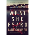 What She Fears: Book 4 in the Adam Kaminski Mystery Series