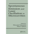 Spontaneous Emission and Laser Oscillation in Microcavities