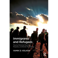 Immigrants and Refugees: Trauma, Perennial Mourning, Prejudice, and Border Psychology